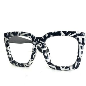 Khandie Woo fashion eyewear. Bold oversized Lensless frame
